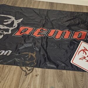 Black Flag with Red 'Demon' Graphic